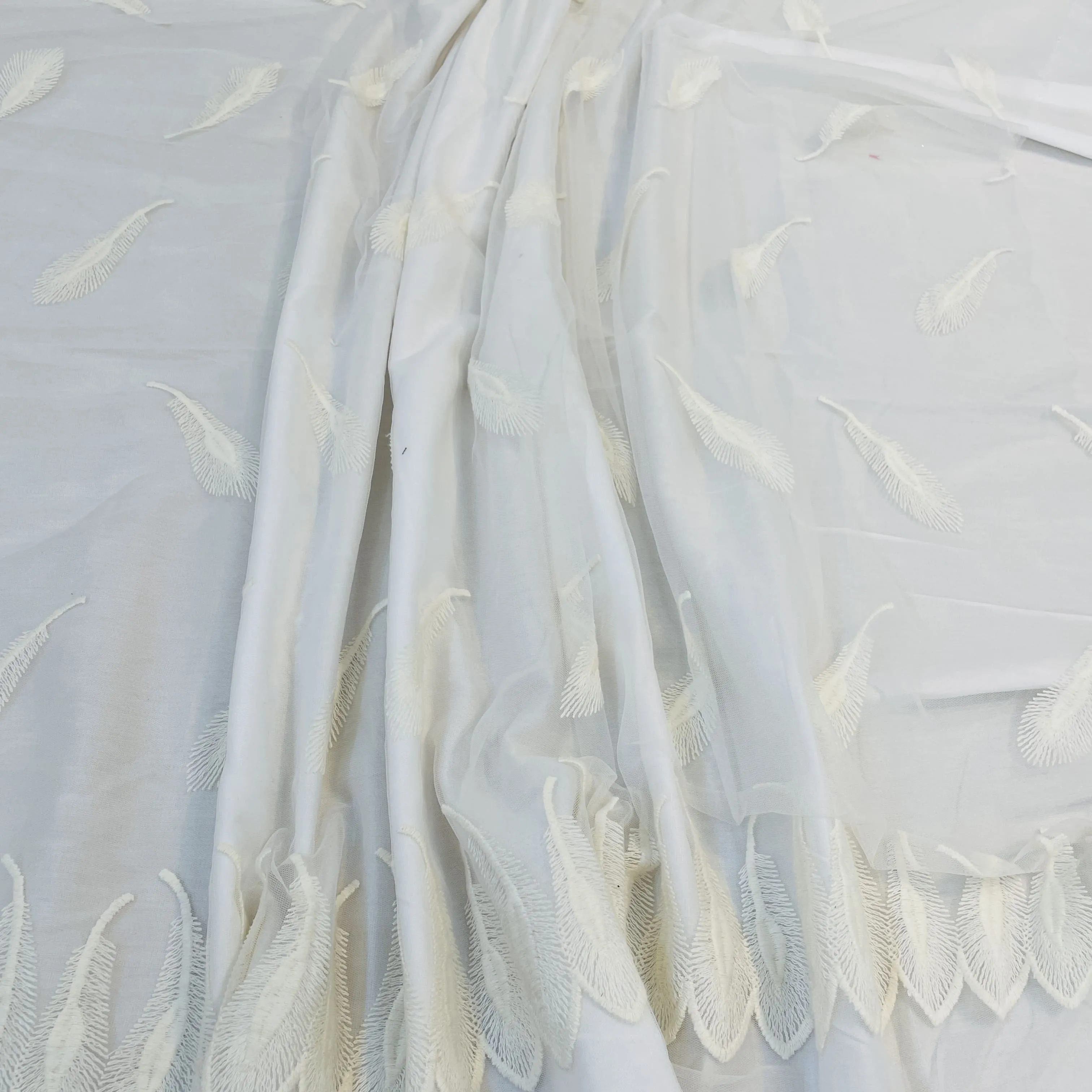 Exclusive Off White Floral Embroidery Dyeable Net Fabric